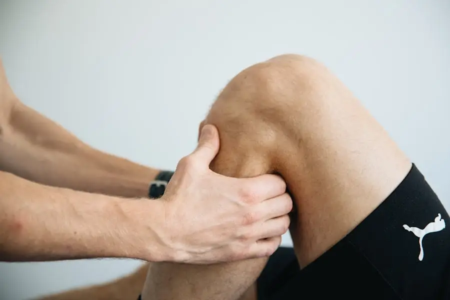 Physiotherapist assessing a knee